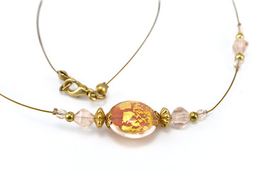 Pendant on golden necklace