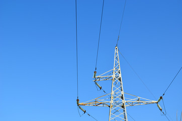 electricity wire and pole in background blue sky