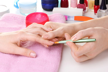 Manicure process in beautiful salon