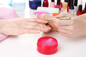 Manicure process in beautiful salon