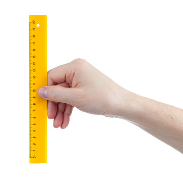 yellow centimetres ruller in hands measure isolated on white