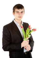 Businessman offering tulip