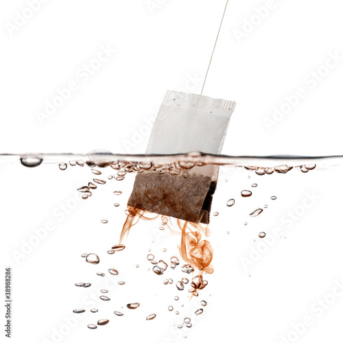 "Green tea bag dipped in hot water" Stock photo and royaltyfree images
