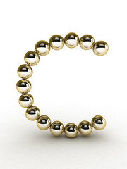 3d alphabet of gold beads.