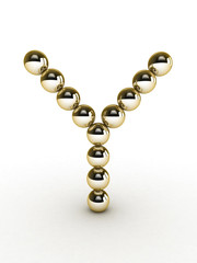 3d alphabet of gold beads.