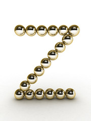 3d alphabet of gold beads.