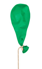 Bursted balloon on cord