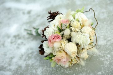Wedding bouquet laying on ice