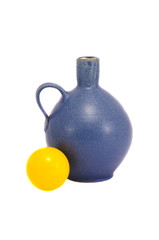 isolated blue vase and yellow ball