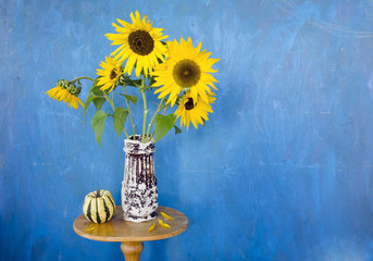 retro vase with sunflowers