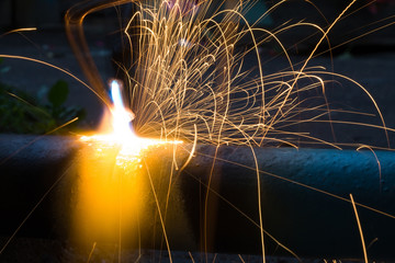 Sparks of the fused metal