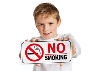 Boy with no smoking sign