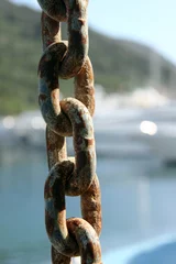 Foto op Canvas anchor chain and yachts in a marina © William Richardson