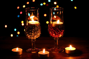 Amazing composition of candles and glasses