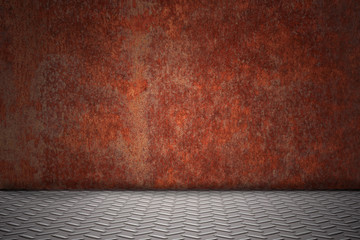 Rostige Wand mit Diamantblechboden