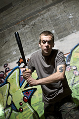 Young man with a baseball bat