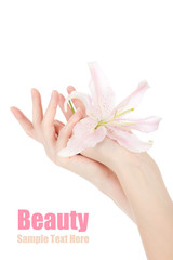 Beauty hands and lily