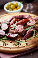 Smoked sausage with rosemary and peppercorns