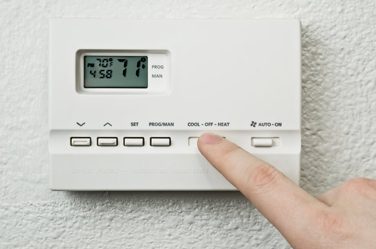 Hand adjusting thermostat