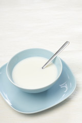Blue bowl with milk