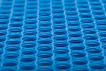 Blue and red plastic caps background