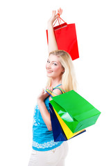 junge blonde Frau mit Einkaufstaschen