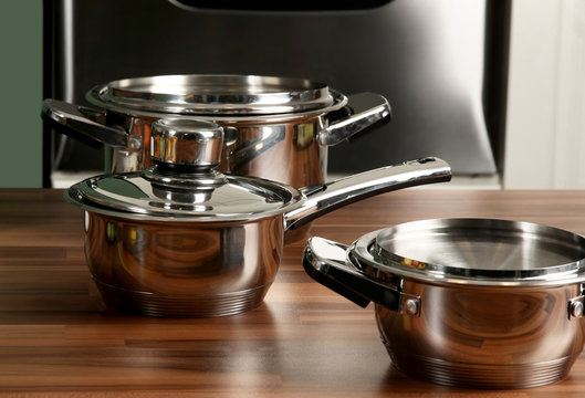 Stainless steel pot with cover in kitchen