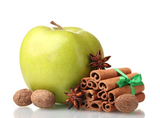 Cinnamon sticks, apple, nutmeg and anise isolated on white