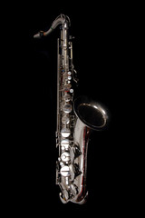 Obraz premium silver saxopphone isolated on the black background