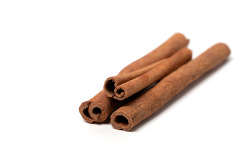Cinnamon sticks on white background