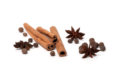 Black peppercorns, anise stars and cinnamon sticks