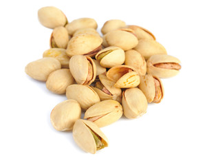salted pistachio nuts on white background