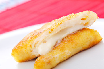 Custard filled pancake in plate