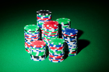 Stack of casion chips on table