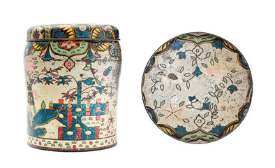 old bank of tin with floral ornaments.