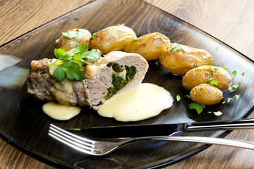 baked pork tenderloin filled with spinach and goat cheese