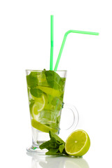 Glass of cocktail with lime and mint isolated on white