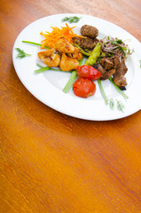 Plate with tasty lamp kebabs