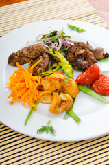Plate with tasty lamp kebabs