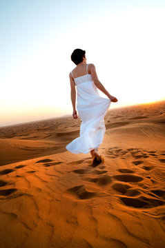 young woman in sandy desert