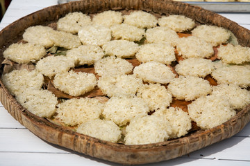 dried rice scone on twiggen plate
