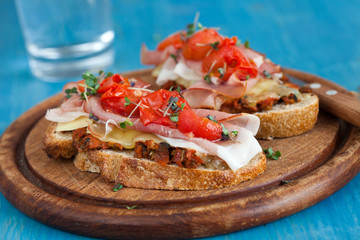 Delicious Bruchetta with ham and tomato