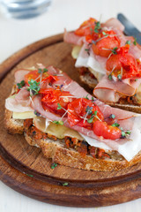 Delicious Bruchetta with ham and tomato