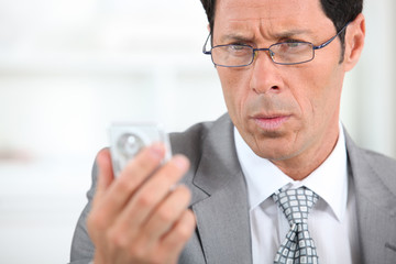 businessman looking concerned
