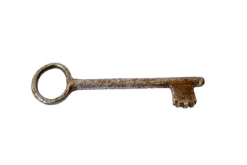 Antic iron key isolated on white