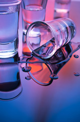 overturned shot glasses