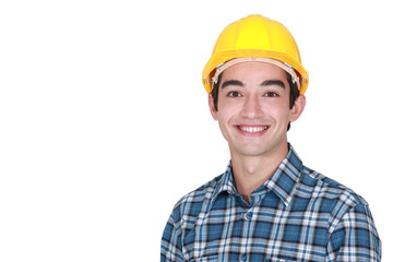 Cheerful young construction worker