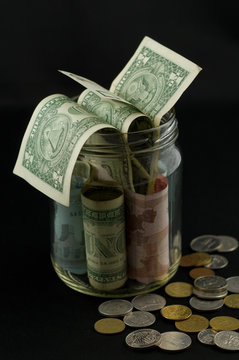 Bank notes in the jar. Dollar, Euro, Zlot