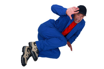 Terrified man lying on the floor