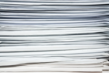 Stack of documents or files, overload of paperwork